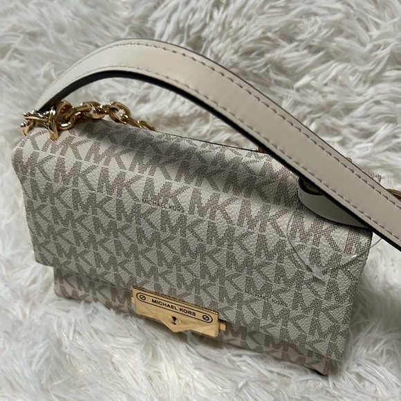 Michael Kore - Picture 3 of 9